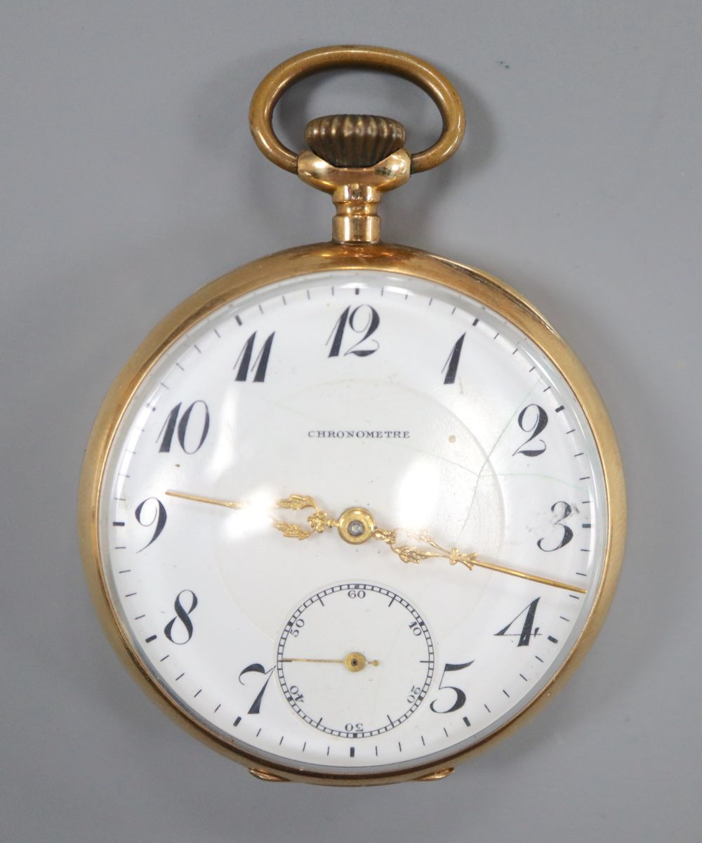 An early 20th century continental 14k open face keyless pocket watch, with Arabic dial and subsidiary seconds,
